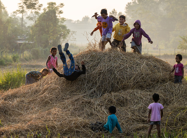 Kids At Play, Nepal Near The Chitwan NP by George Pearson
