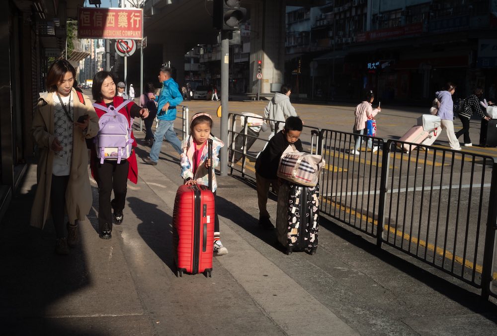 Holiday Tourists, Hong Kong by Kaikong Wong