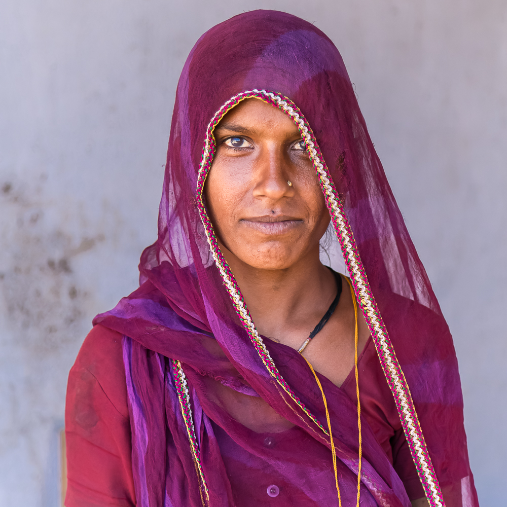 Lady In Purple, Rajasthan, India by Neil Harris