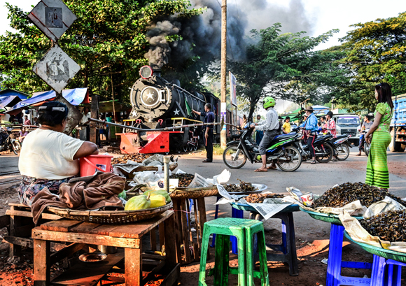 STREET RUNNING THROUGH THE MARKET By Ian Silvester April