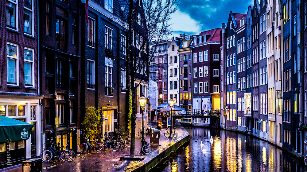 Canal near Dam Square, Amsterdam, by Christopher Rusted