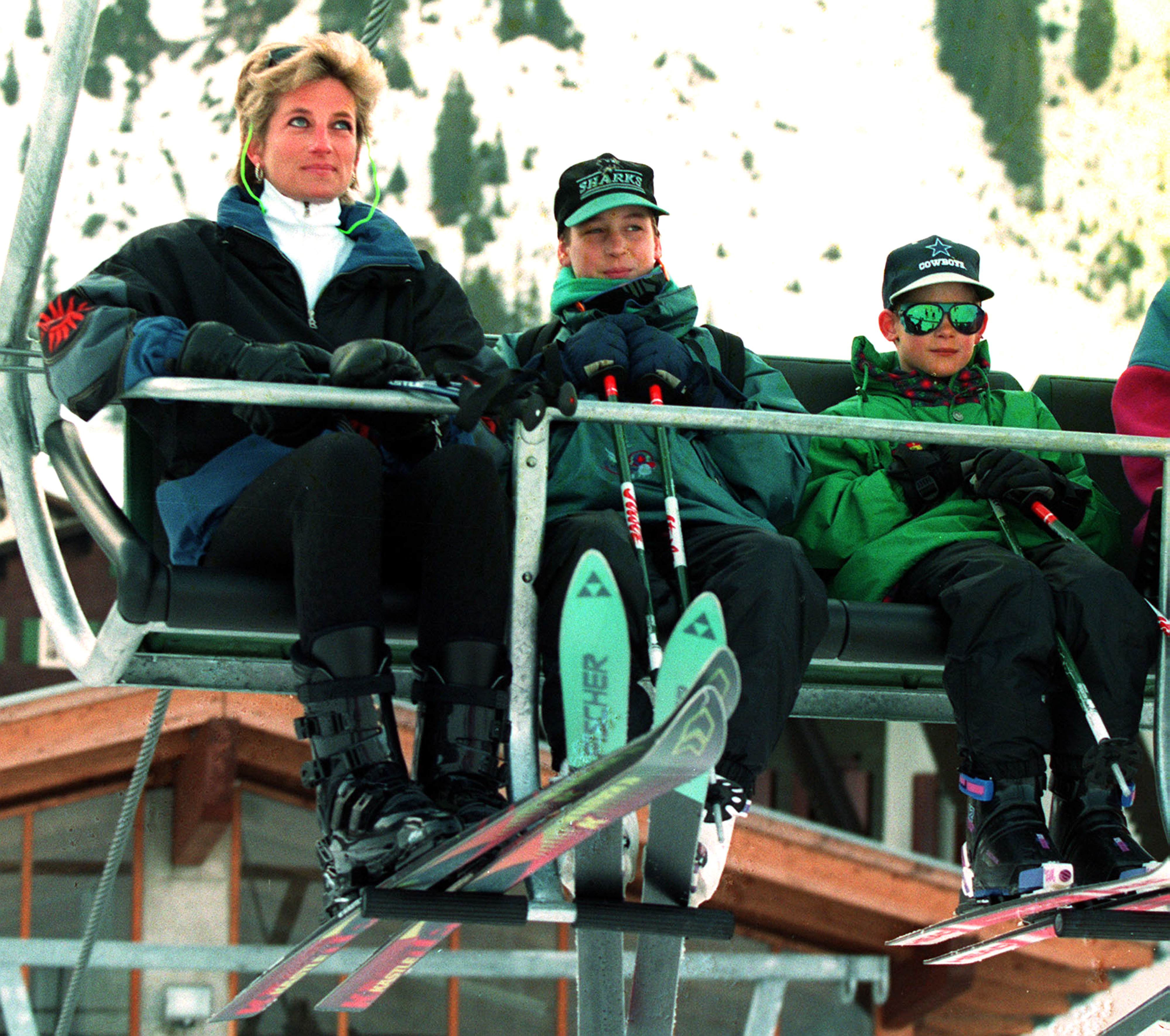 1994: Diana, Princess of Wales, and her two sons, Prince William (centre) and Prince  Harry, ride a ski lift during their Easter skiing holiday in the Austrian resort of Lech.