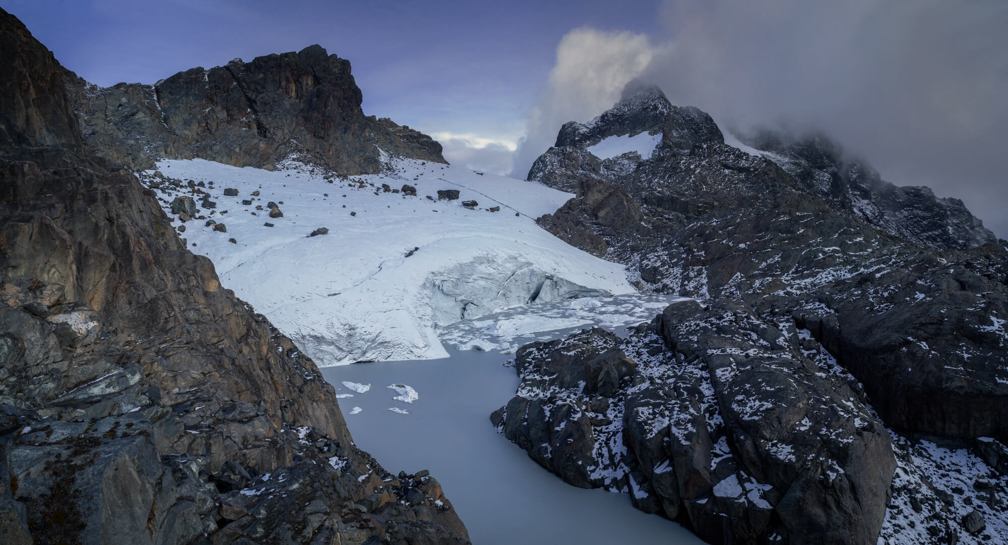 The Rwenzori Mountains once held glaciers on three peaks, but climate change has led to massive glacier loss