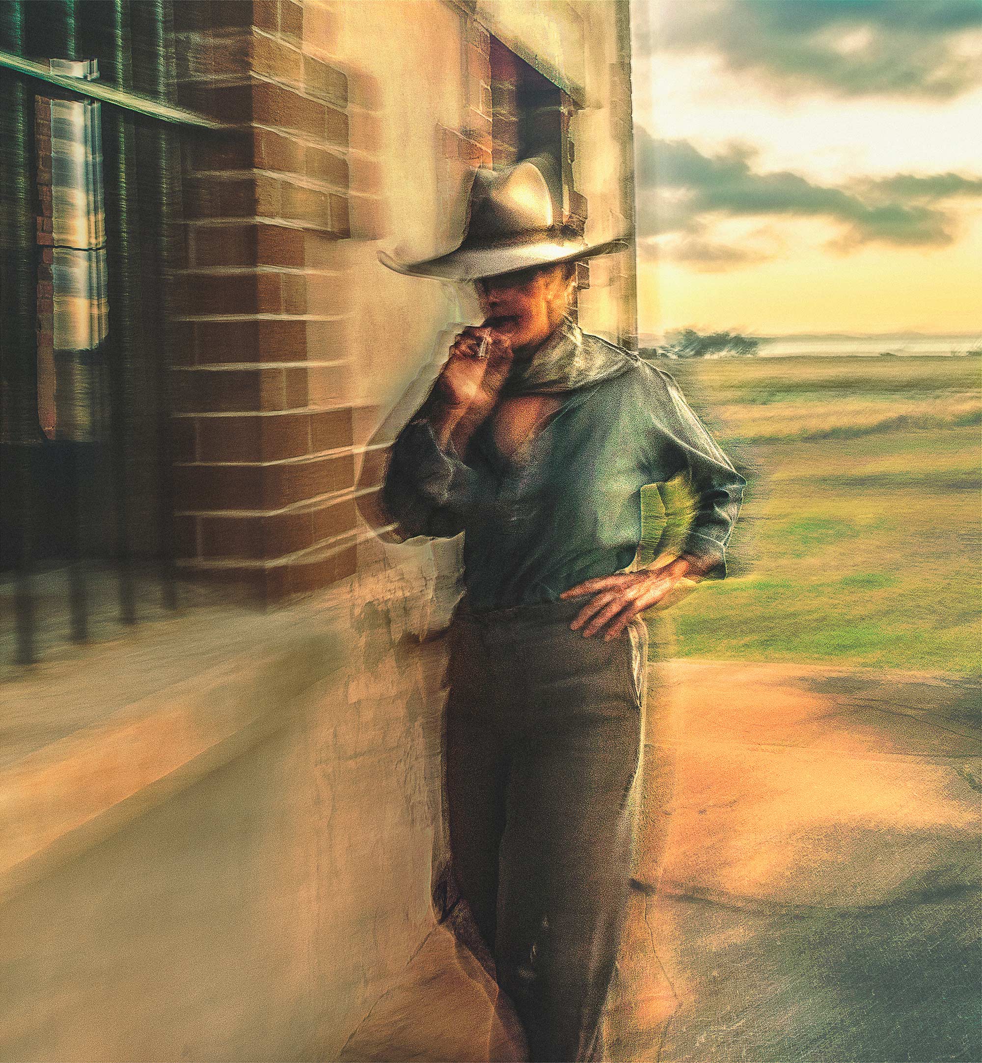 a rancher smokes a cigarette in the australian outback