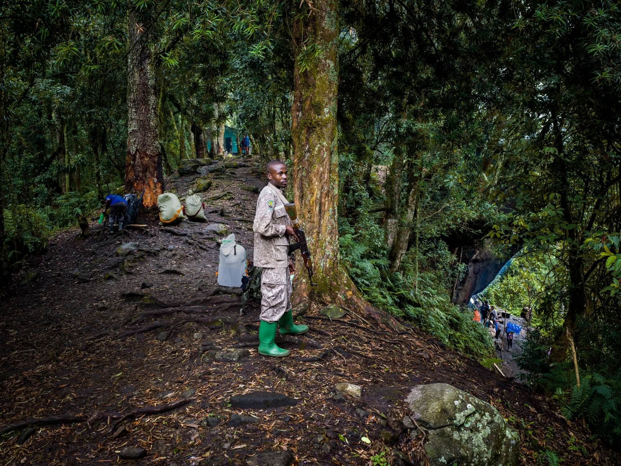 A ranger from Uganda Wildlife Authority accompanies the expedition with Project Pressure.