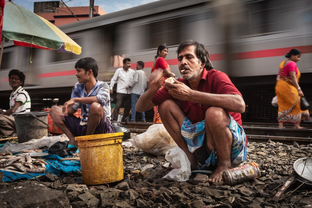 Smoke Break, Kolkata Railway Community, India by David Huggett