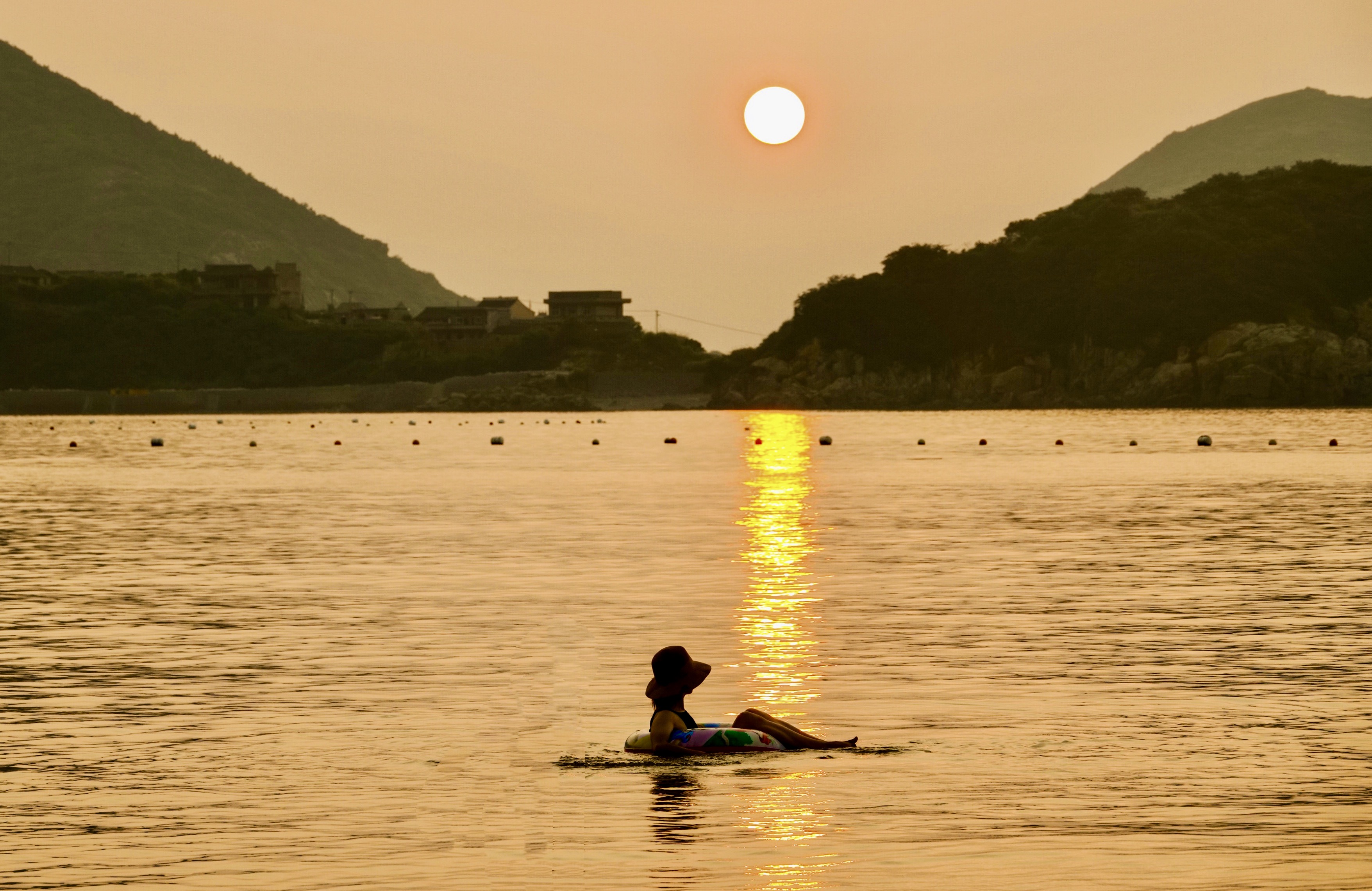 Lady In Sunset By Raymond Zhang (China)
