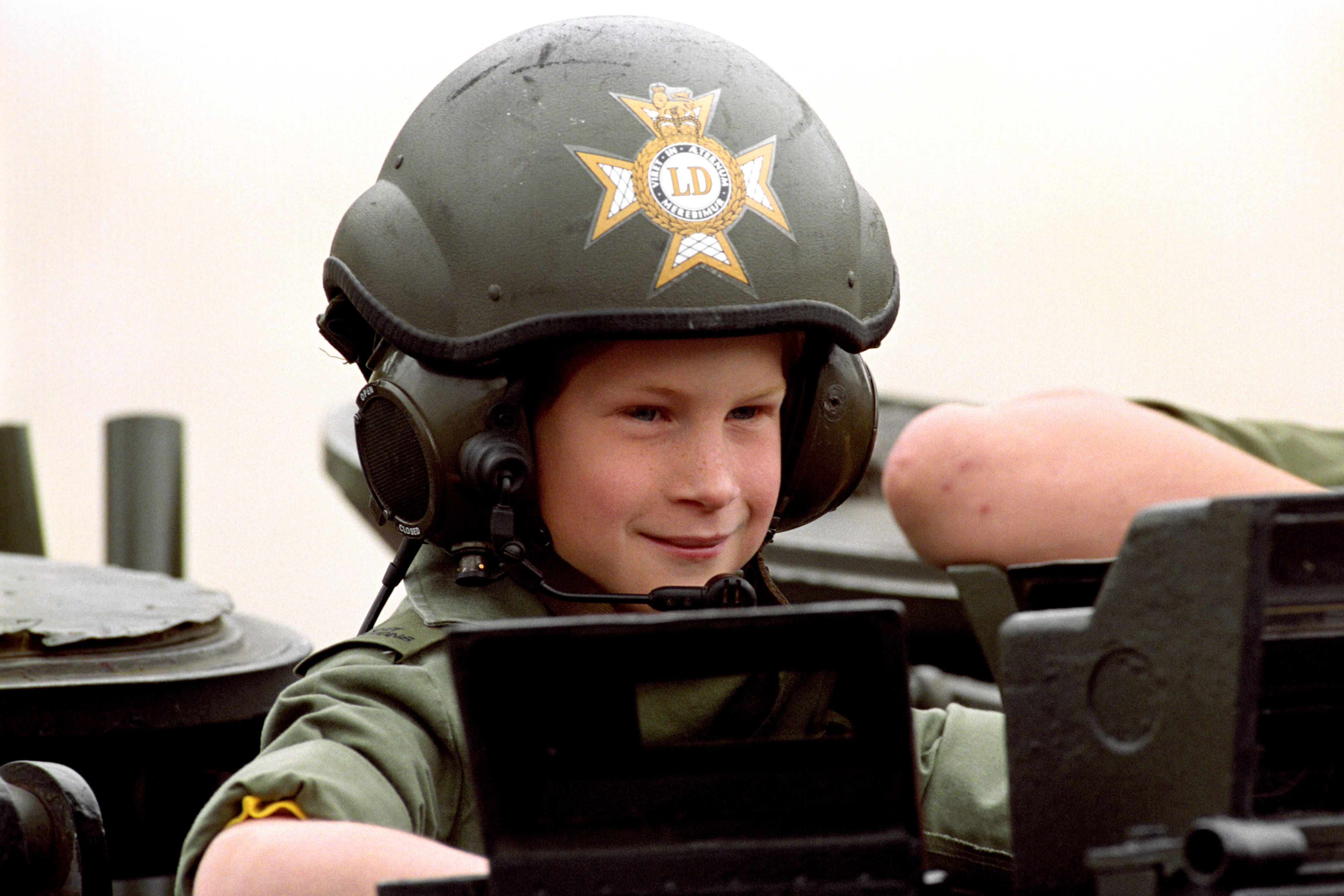 1993: Prince Harry rides in a light tank during a visit to the barracks of the  Light Dragoons in Hannover, Germany
