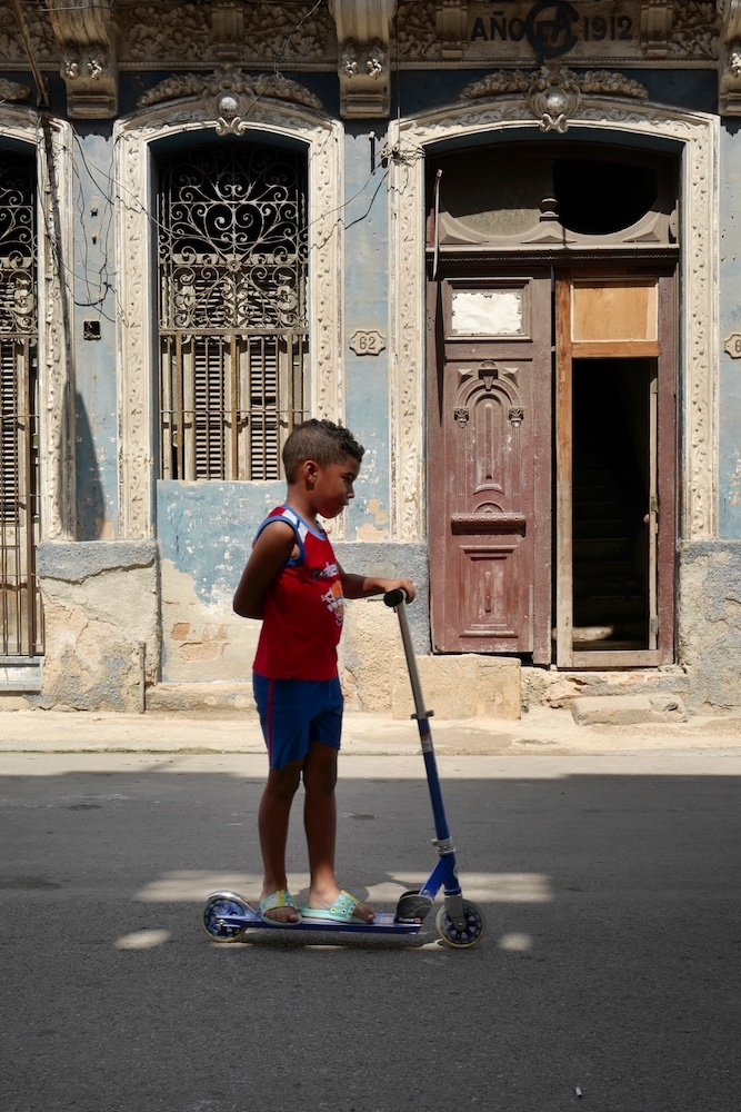 Kid in Old Havana, Cuba by Kaikong Wong