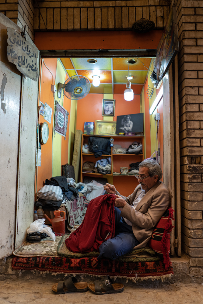 Repairing Clothes, Souq Al-Saray, Baghdad by Donatas Gricius