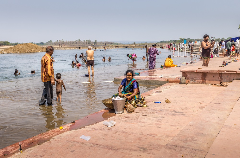 Bathing at Rapta Ghat on the Holy Narmada River, Madhya Pradesh, India by Alison Mees