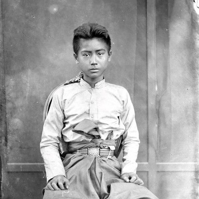 Studio photographic portrait of young man. 