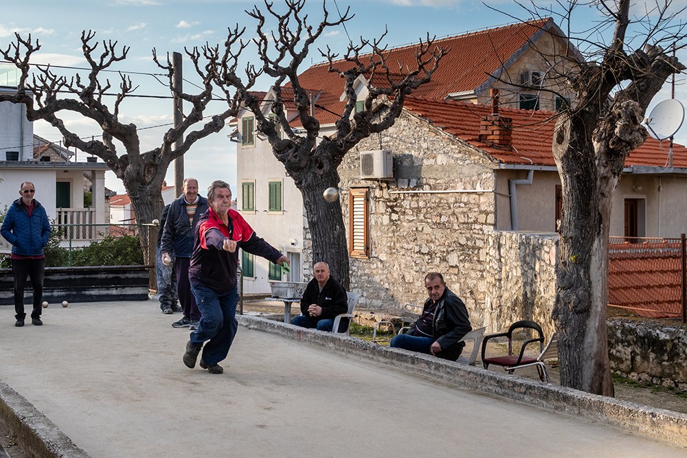 Playing Balote On Brac Island, Croatia by Graham Vulliamy