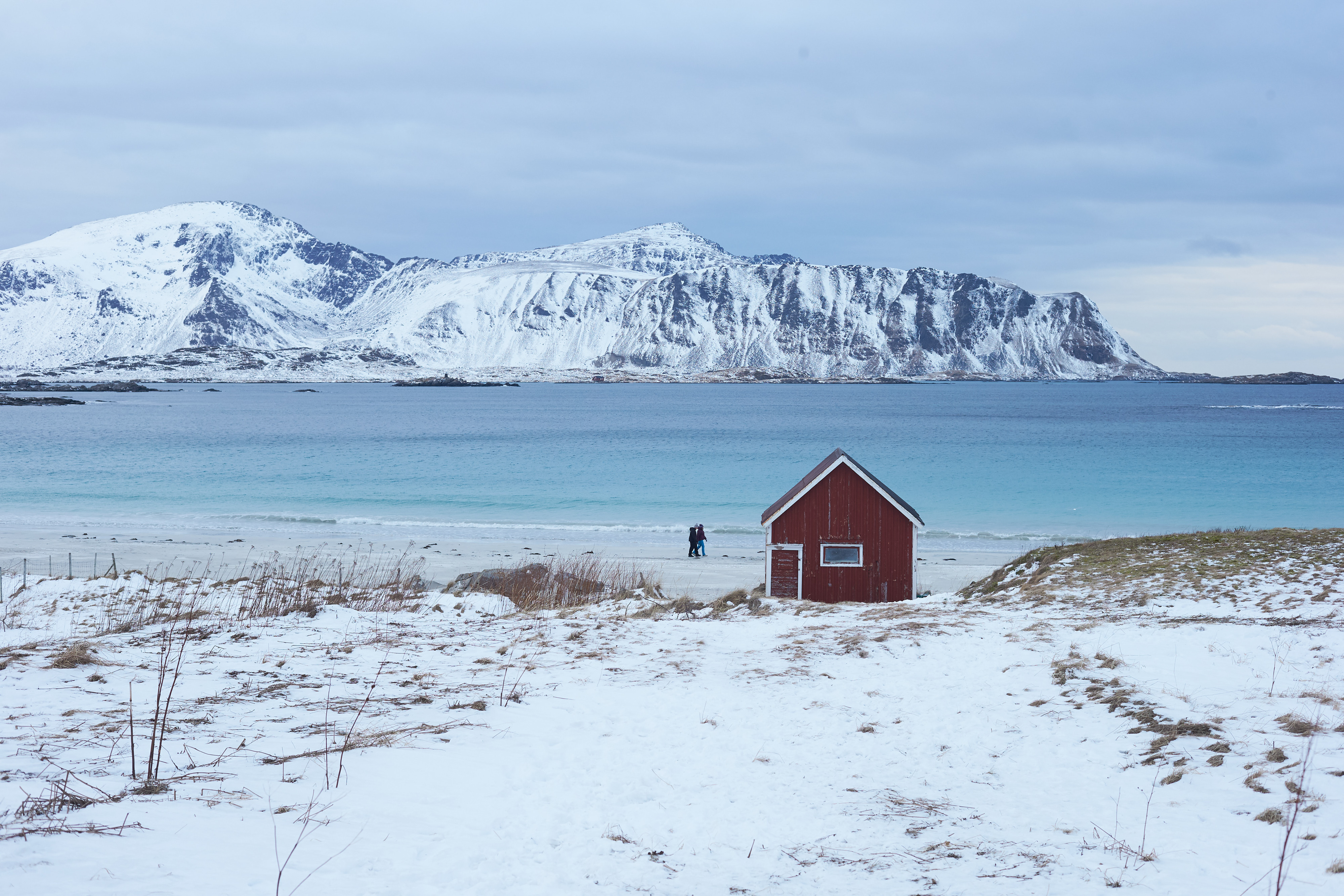 MK 10 Red hut at Ramberg beach, on the Lofoten islands, in the Arctic Circle in Norway.
