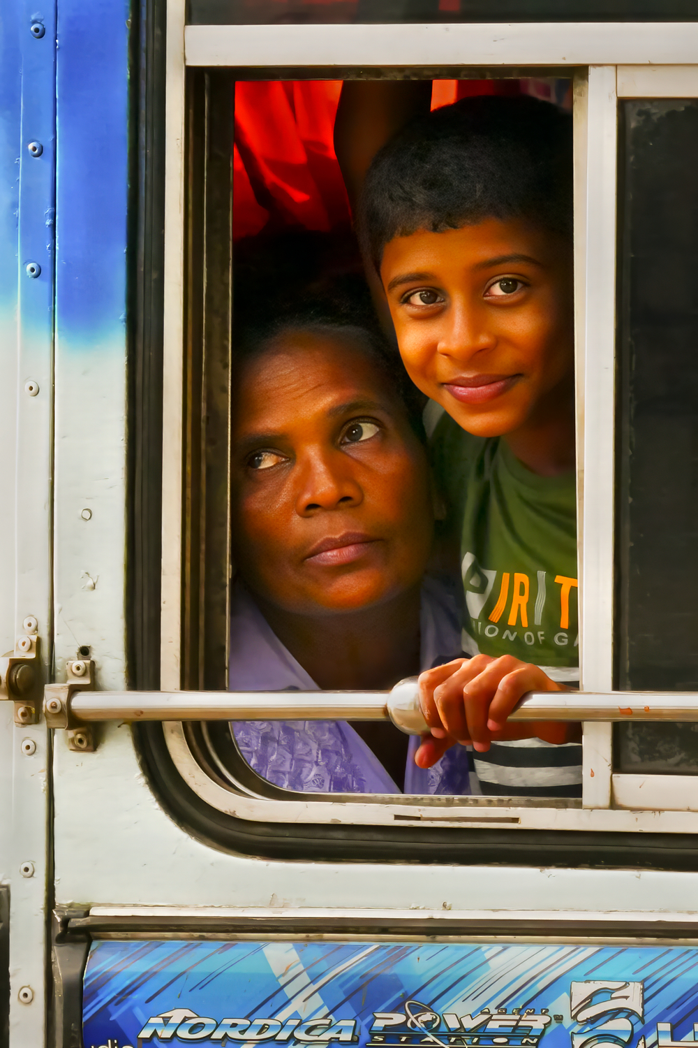 Boy On A Bus Kataragama Sri Lanka by Rob Morgan