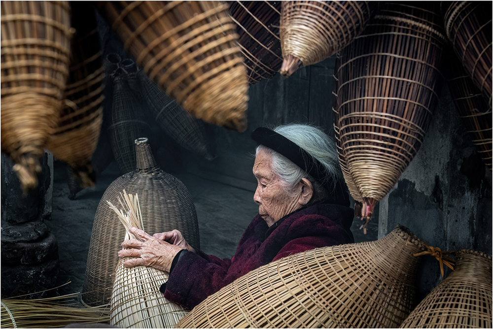 Fishing Float Weaver, Tien Lu, Vietnam by Brian Houghton