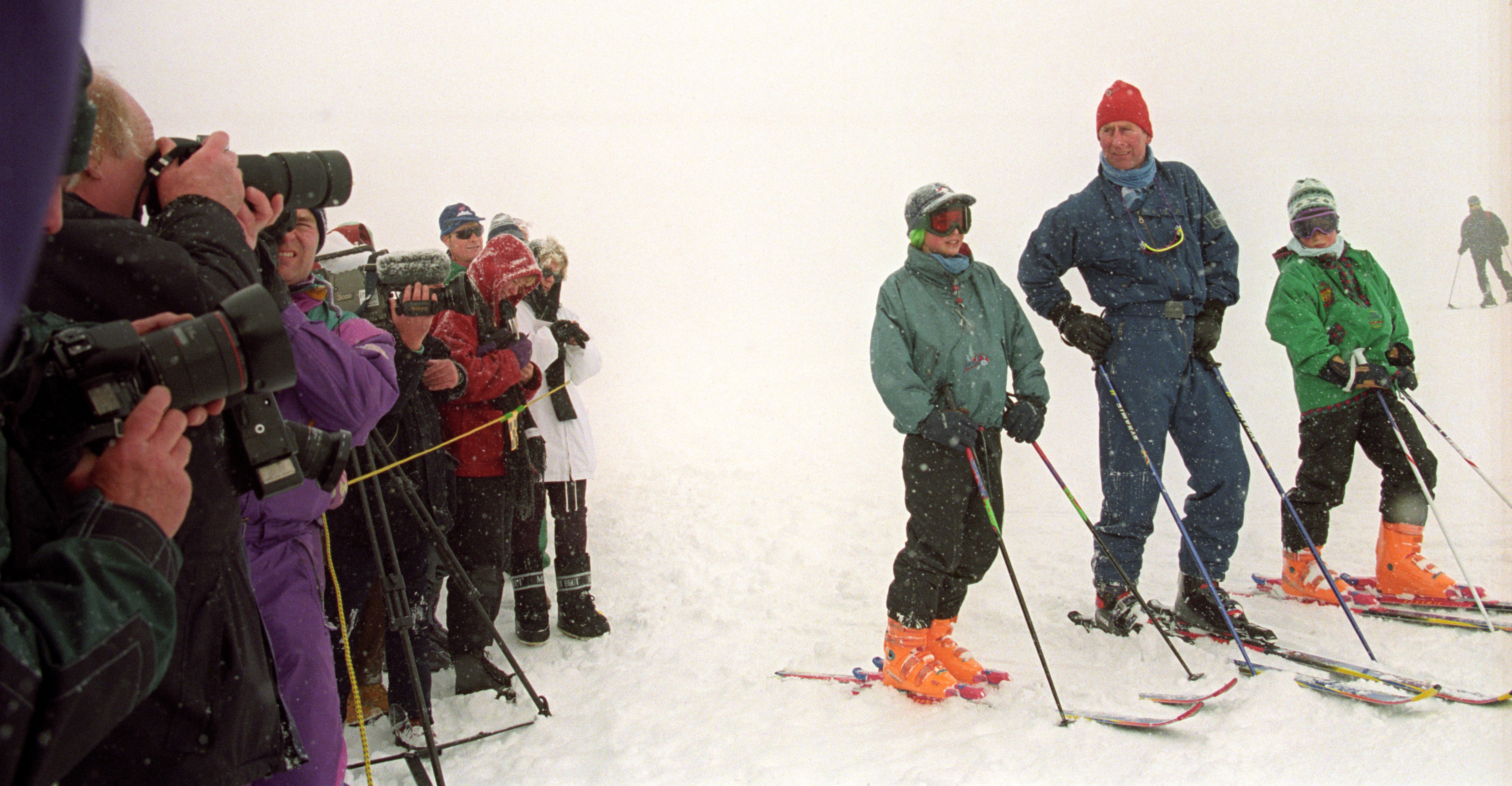 1995: the Prince of Wales with his sons, Prince William (L) and Prince Harry during an informal Photo call on the pistes of the Madrisa mountain above the exclusive  Swiss ski resort of Klosters.