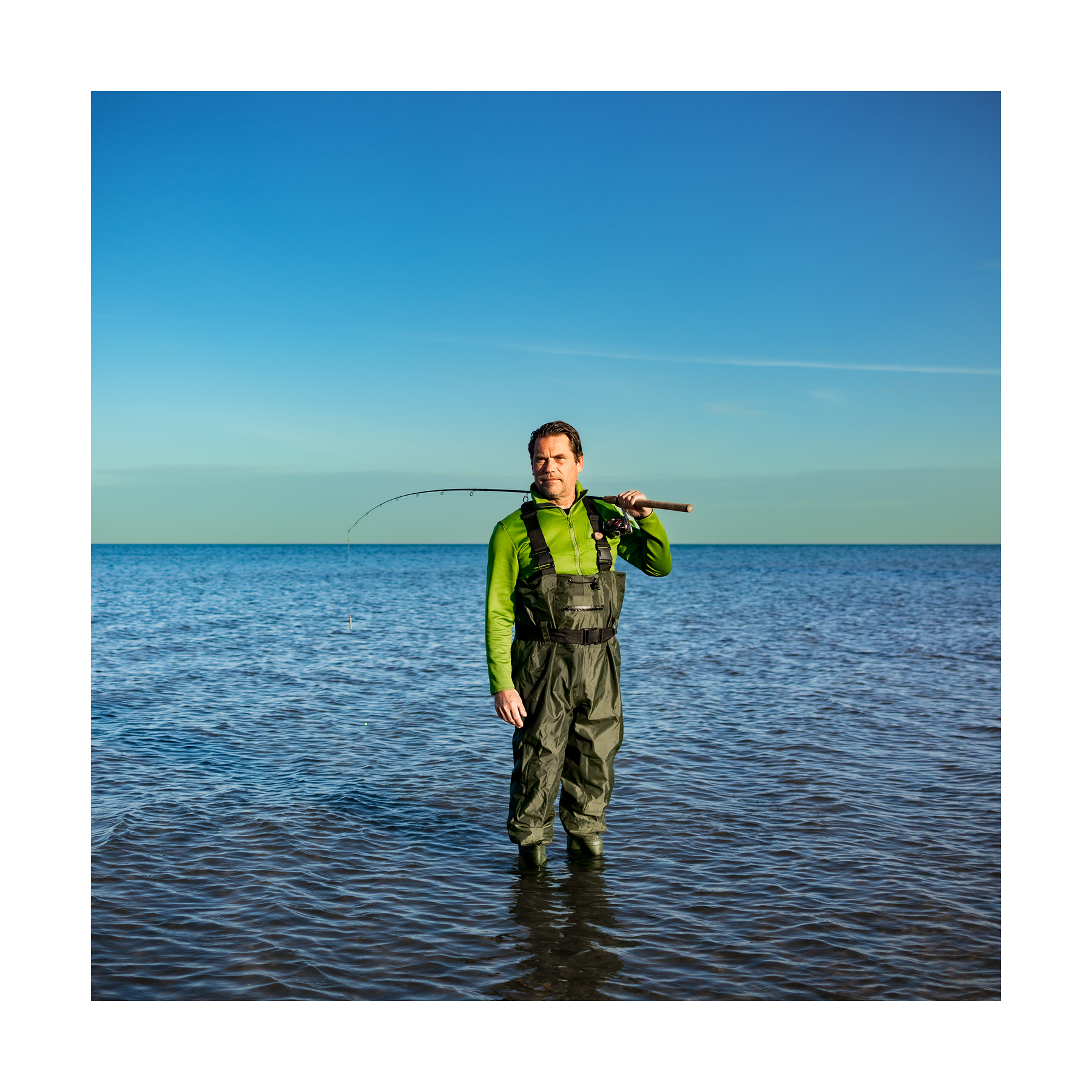 Jacques Fishing Lake Ontario by Trish Crawford