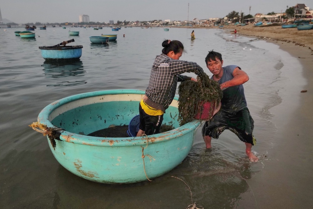 Early Morning Fishing, South Vietnam by Kaikong Wong