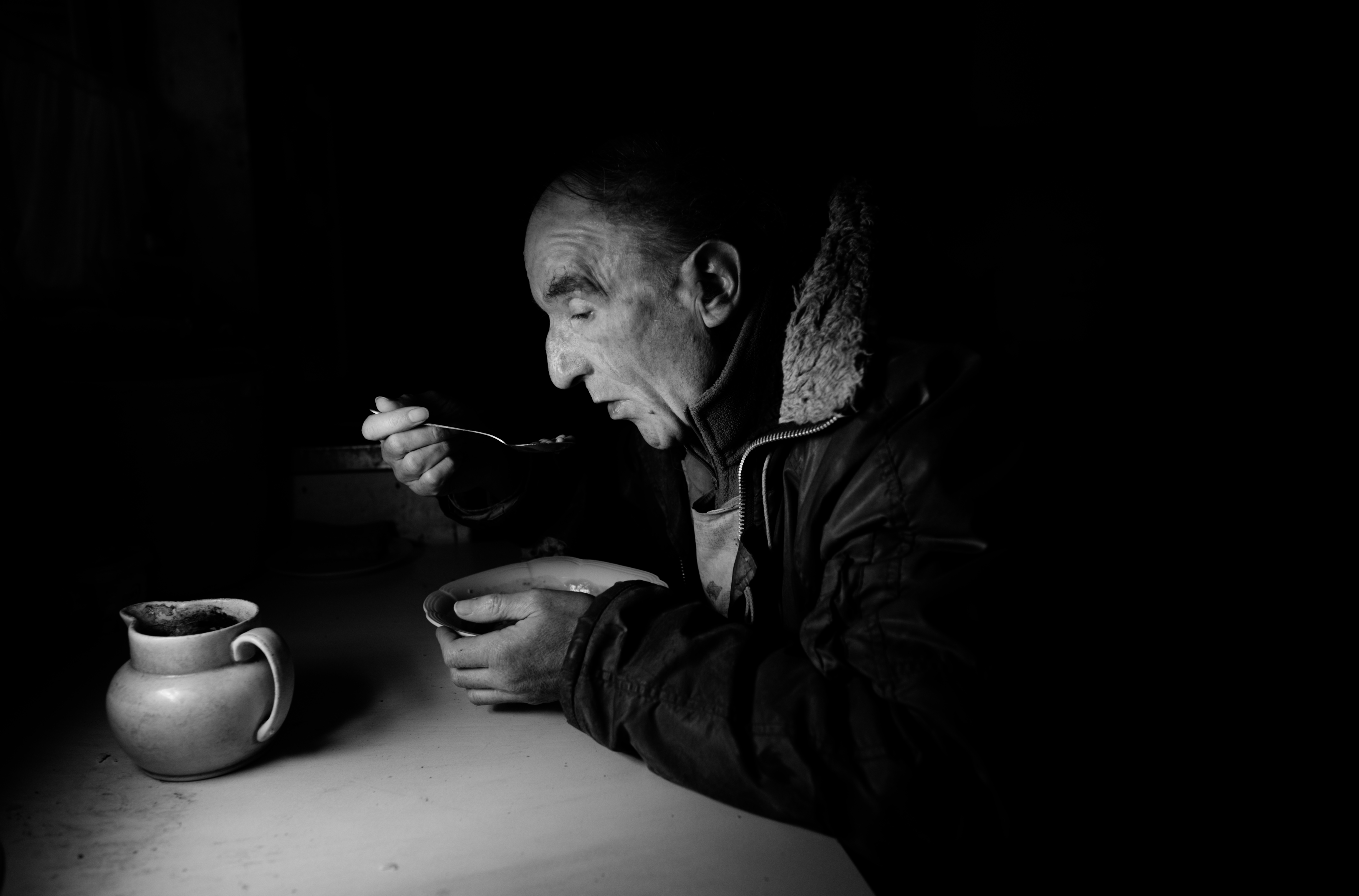 Man eating soup