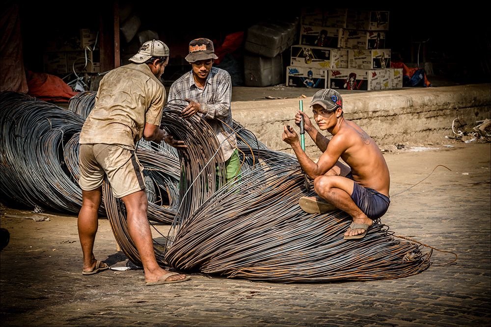 Yangon Steel Wire Cutting In Dockyard by David Portwain