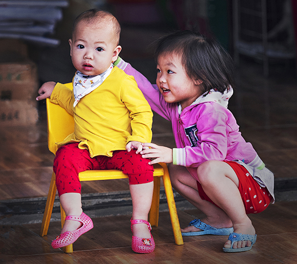 At Play At The Market Stall, Bac Ha, Vietnam