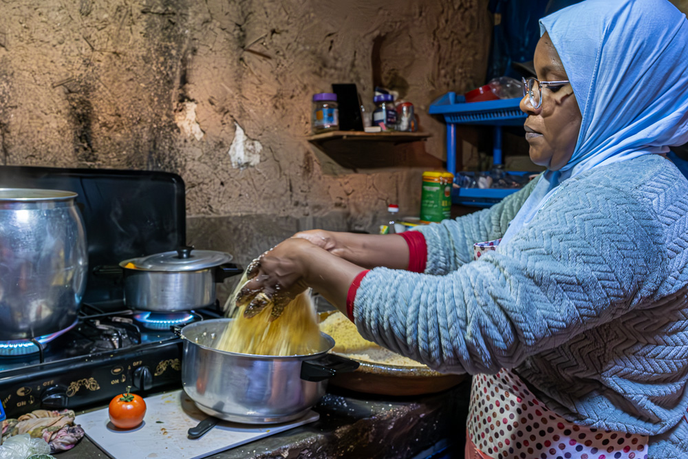 Preparing The Cous Cous For Lunch, Morocco by Jane Tearle
