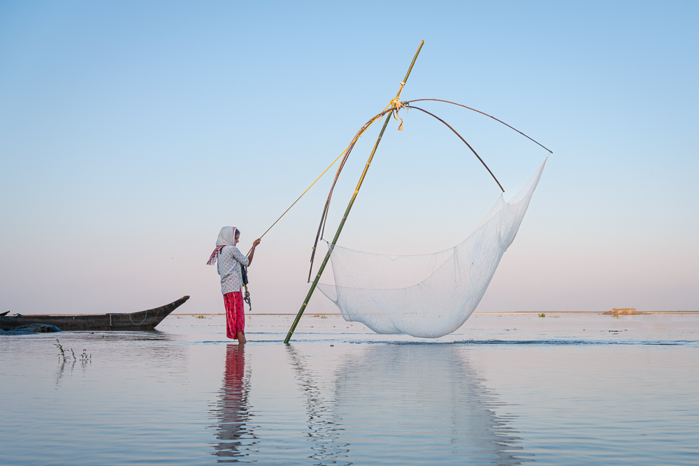 Fishing In The Subansiri River, Assam by David Huggett