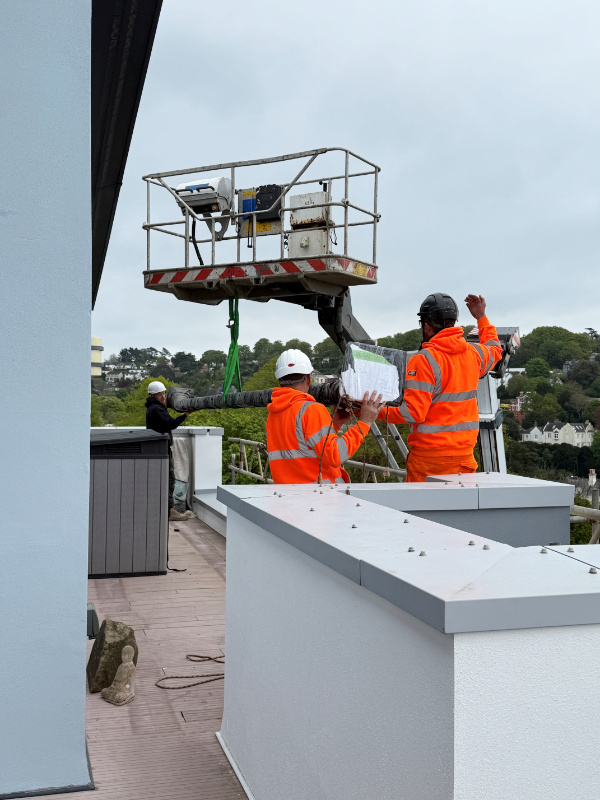 men using a cherry picker